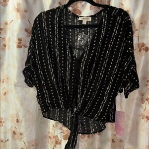 Chic Black and White Blouse with Elegant Design